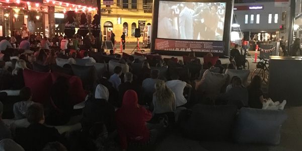 guests love bean bags during pop up cinema in Acland Village, Melbourne